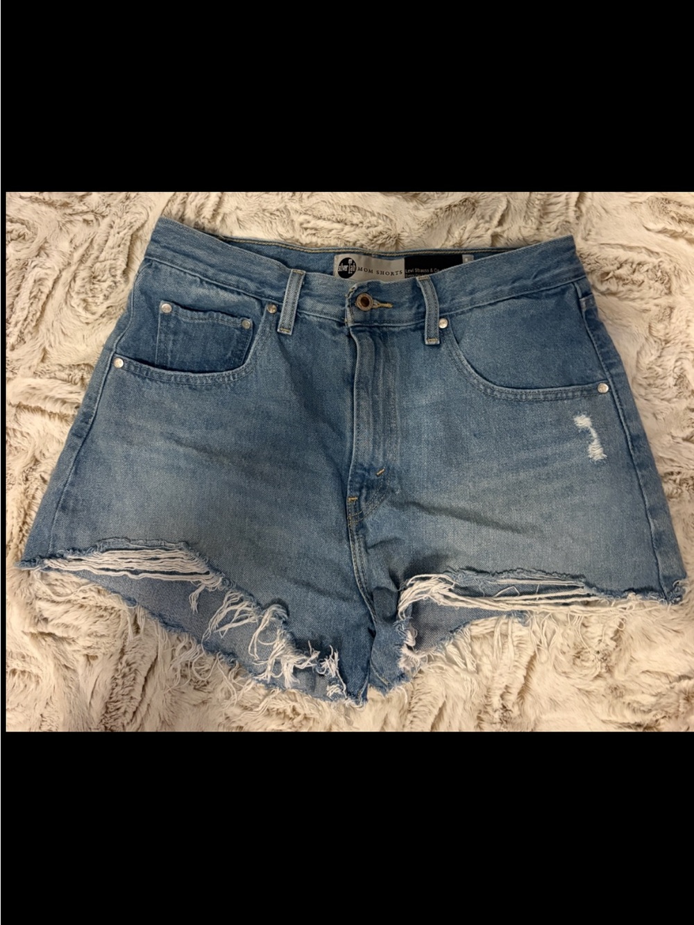 Levi's Light Blue Distressed Denim Shorts